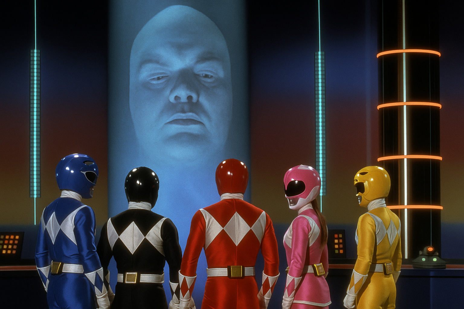 A imagem ilustra o post com o tema: Quem Era Zordon? A História do Mentor dos Power Rangers. A imagem mostra zordon em seu tubo na base dos power rangers conversando com os 5 rangers originais.